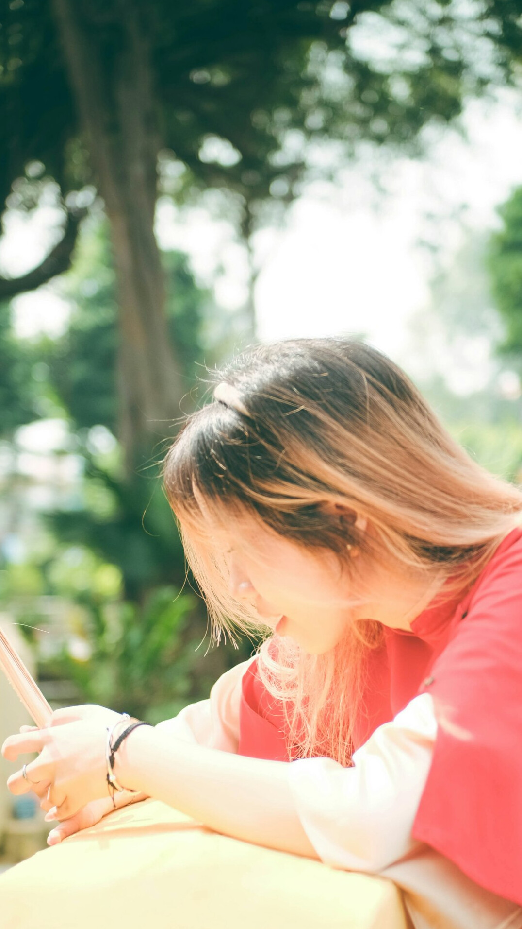 Young Croatian woman looking closely at a laptop screen while learning
