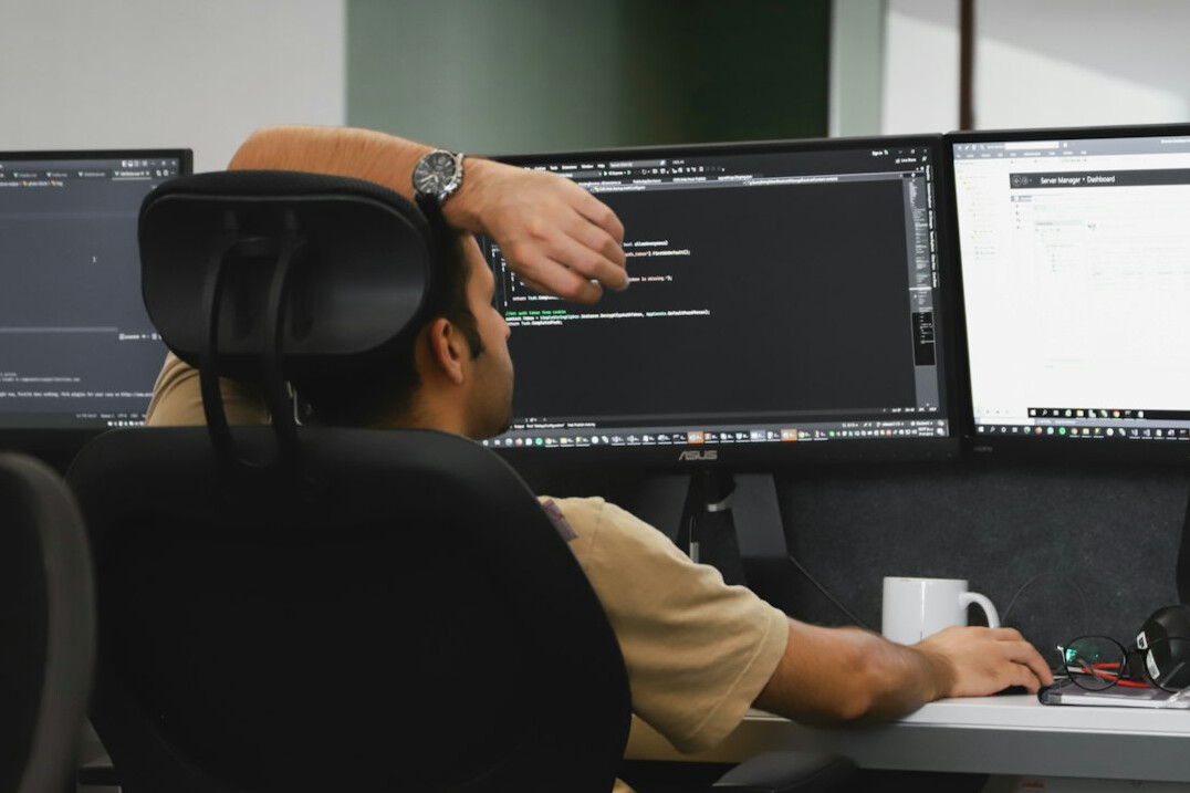 student learning code at desk